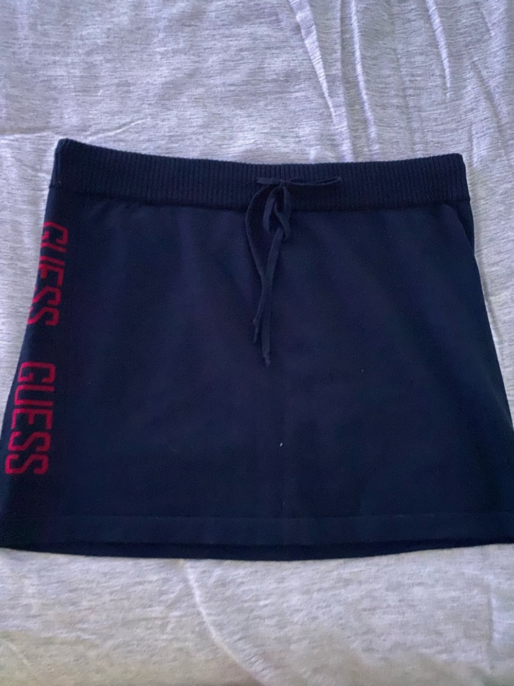 GUESS black Mini Skirt with Red Logo Side Stripe